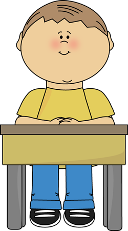 Boy_Sitting_at_School_Desk